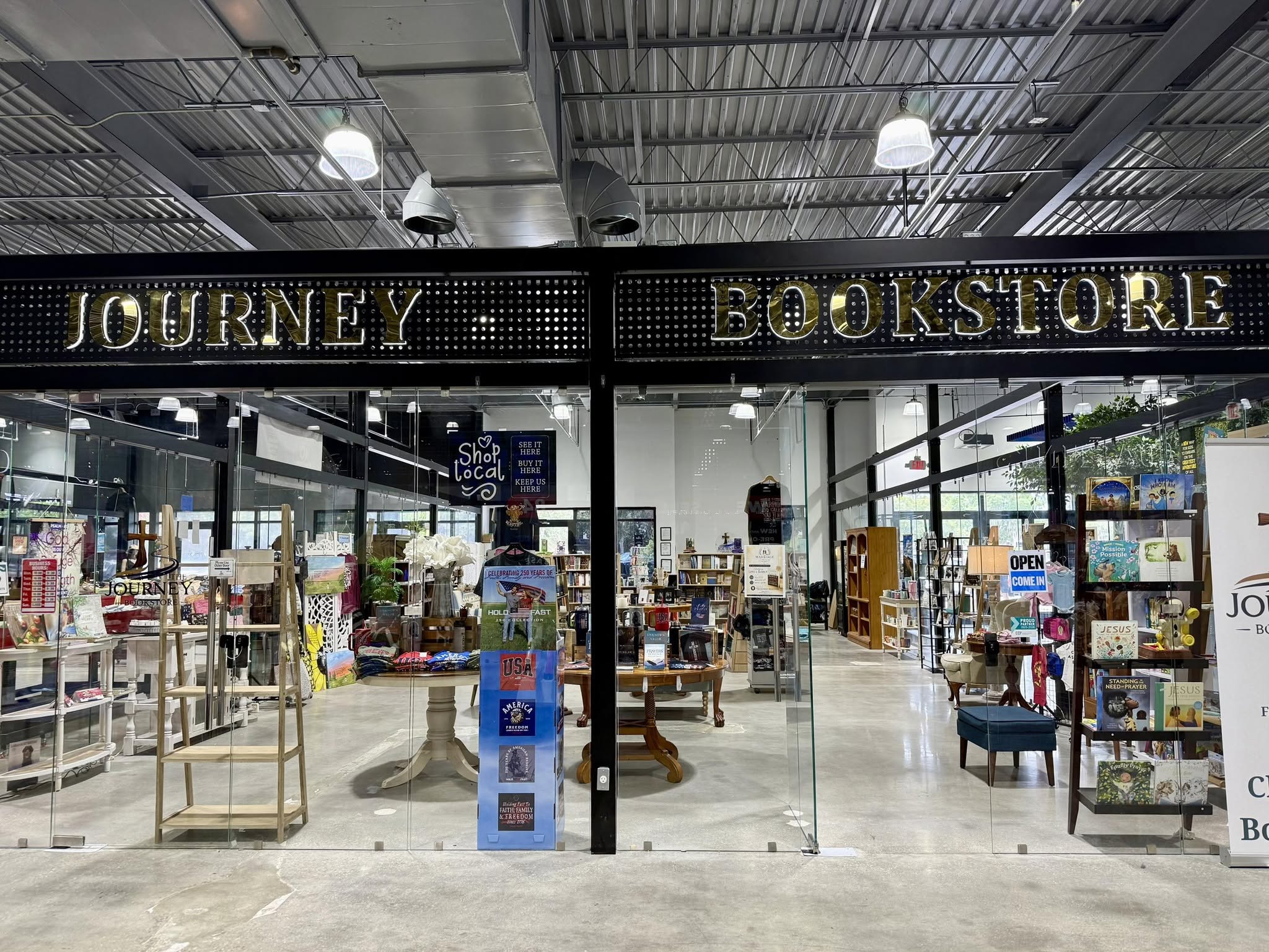 Our bookstore at The Paddock Market. A new chapter next to Belk is coming soon.